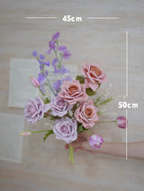 ピンクとライラックの人工フラワーアレンジメント（花瓶入り）