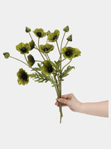Olive green artificial poppy stems held in hand to show the flower arrangement