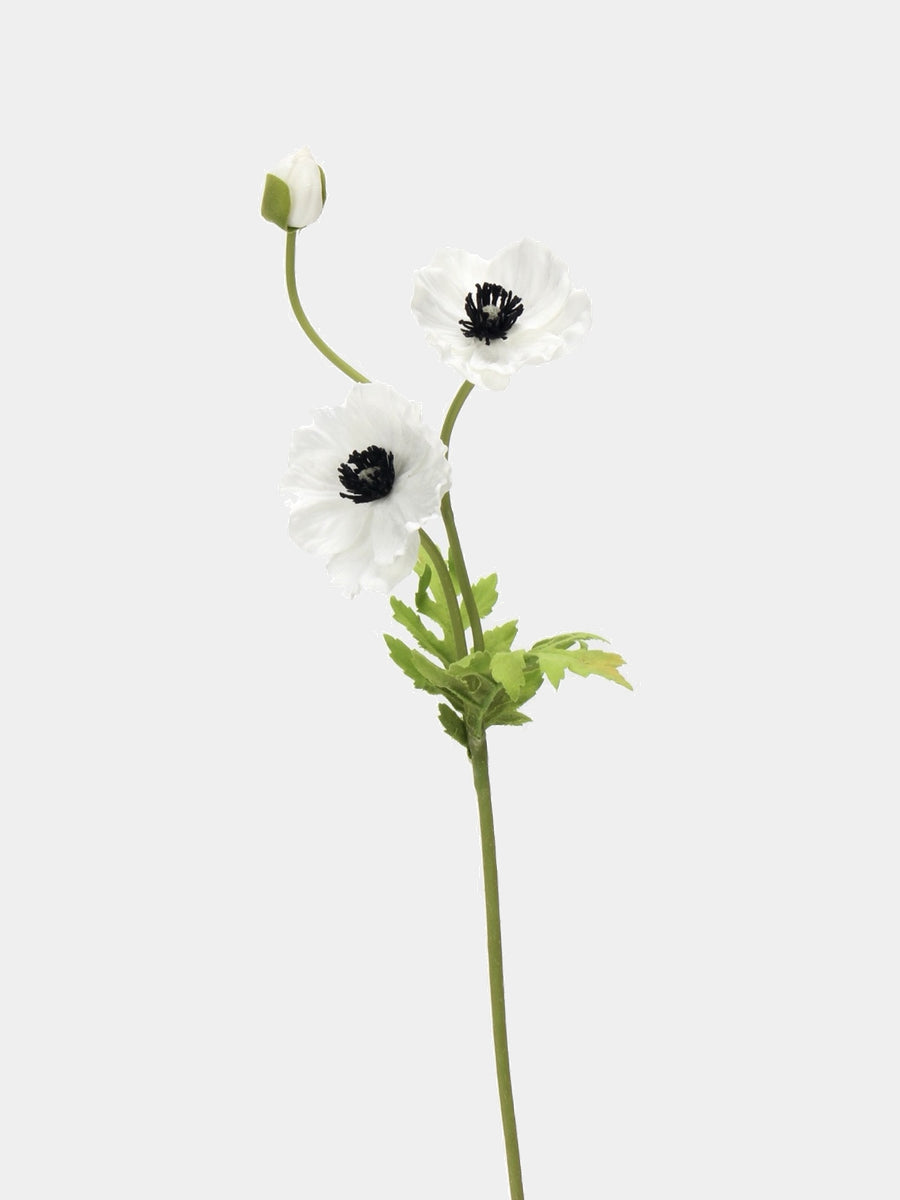White artificial poppy stem with two open flowers, one bud and green leaves, 45 cm tall