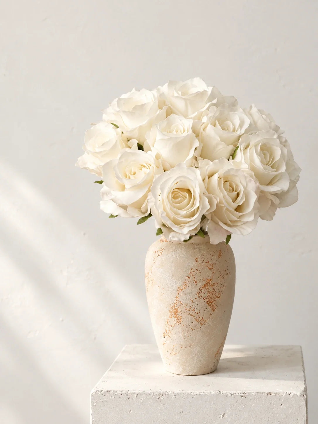 Real Touch Elsa Rose Bouquet, 13 roses – White shown in an ivory vase (vase not included)