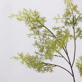 Green faux asparagus fern foliage detail