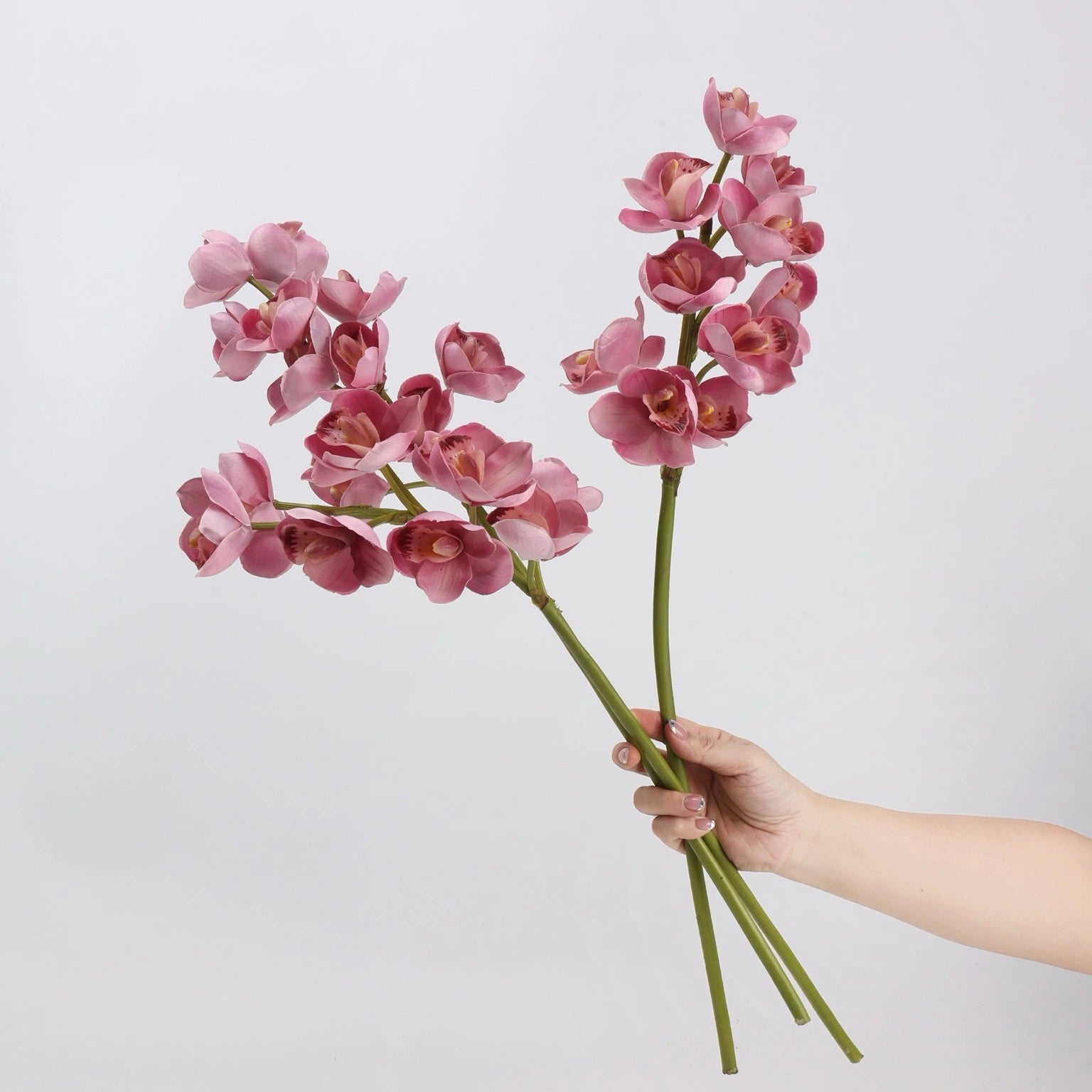 Pink faux cymbidium orchid stems