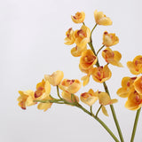 Yellow faux cymbidium orchid flower detail