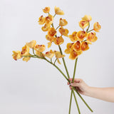 Yellow faux cymbidium orchid stems