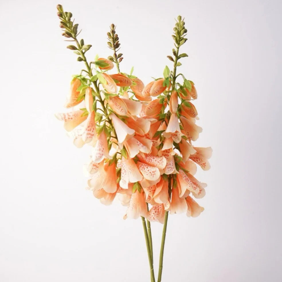Group of peach faux foxglove flower stems