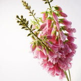 Group of pink faux foxglove flower stems
