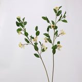 Pair of light yellow faux magnolia flower branches