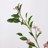Pink faux magnolia bloom and foliage detail
