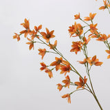 Orange faux flowering branch detail