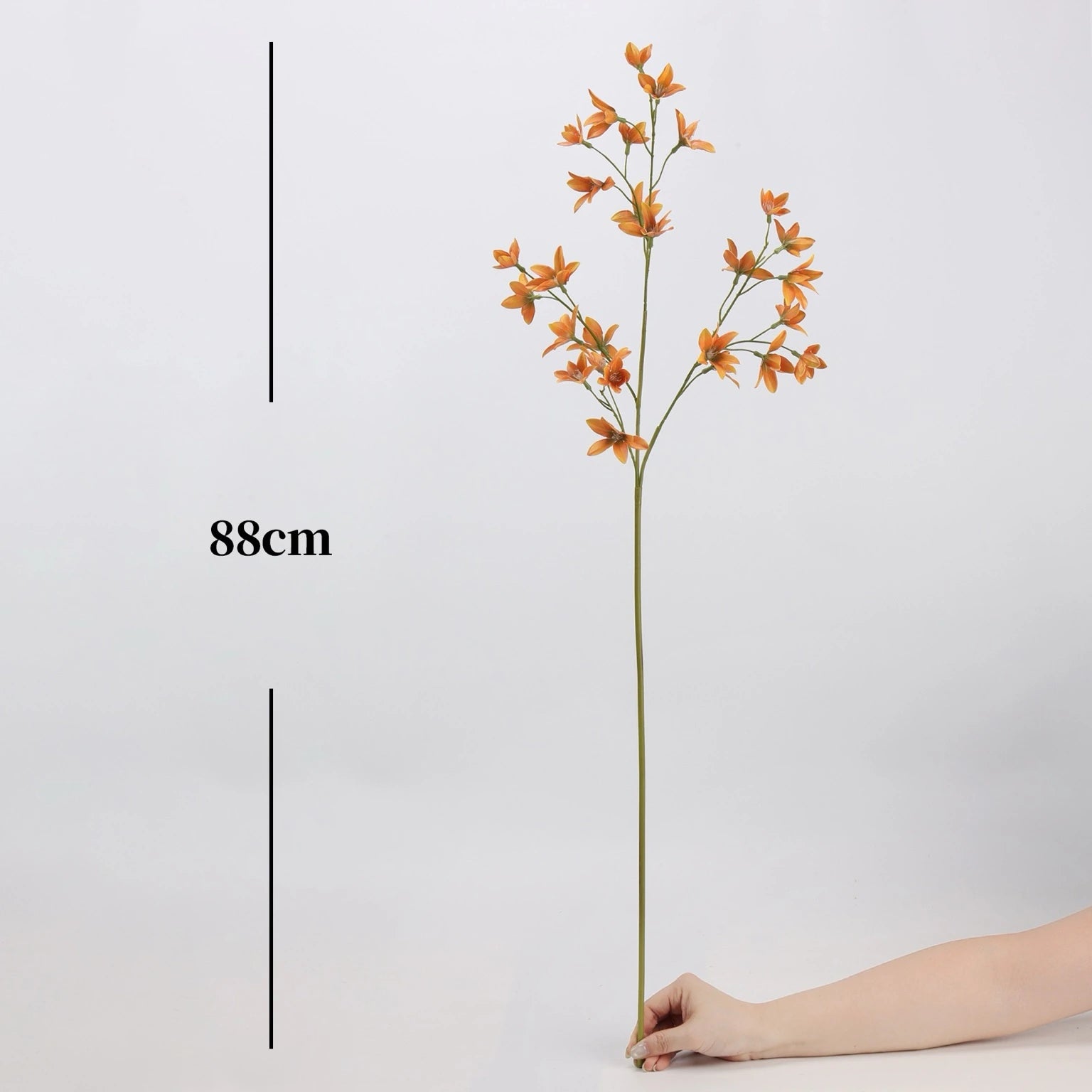 Faux flowering branch size 88 cm