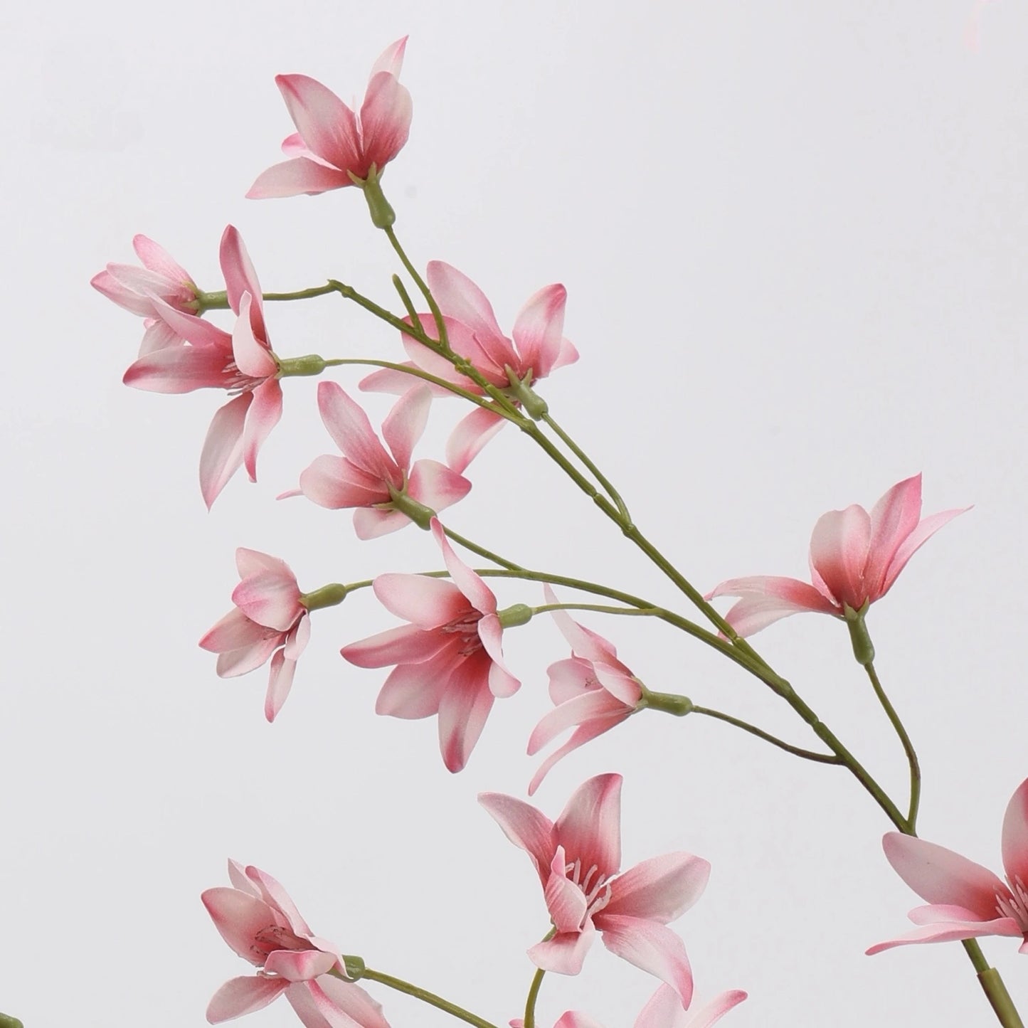 Pink faux flowering branch detail