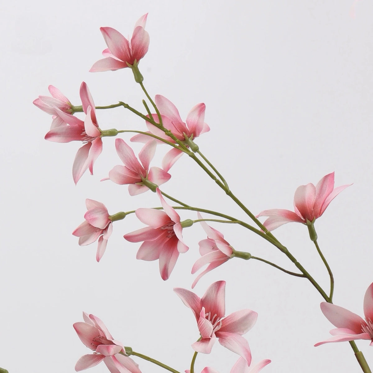 Pink faux flowering branch detail