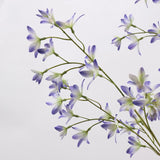 Purple faux flowering branch detail