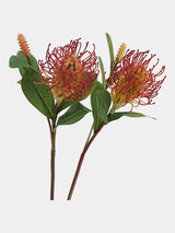 Red and coral faux foxtail pincushion flower stems, front view