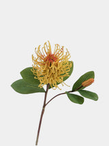 Faux small pincushion flower stem in yellow