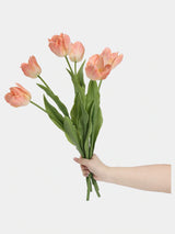 Apricot large Real Touch Armani tulip stems held in a hand
