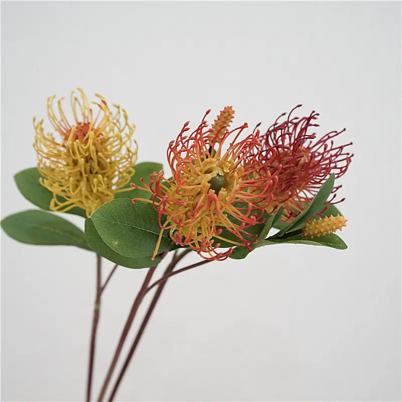 Faux small pincushion flower stems in assorted colours