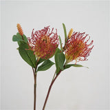 Red and coral faux foxtail pincushion flower stems, front view