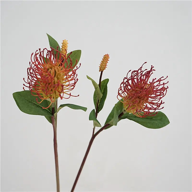 Red faux foxtail pincushion flower stems, side view