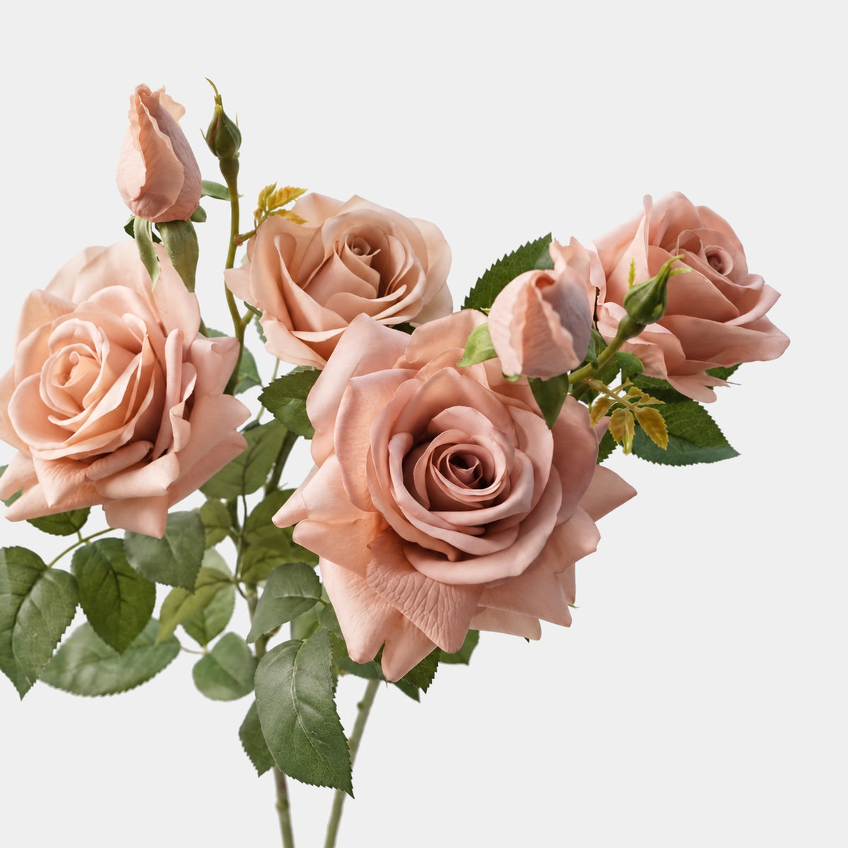 Close-up of nude and light brown Real Touch artificial roses grouped with green foliage